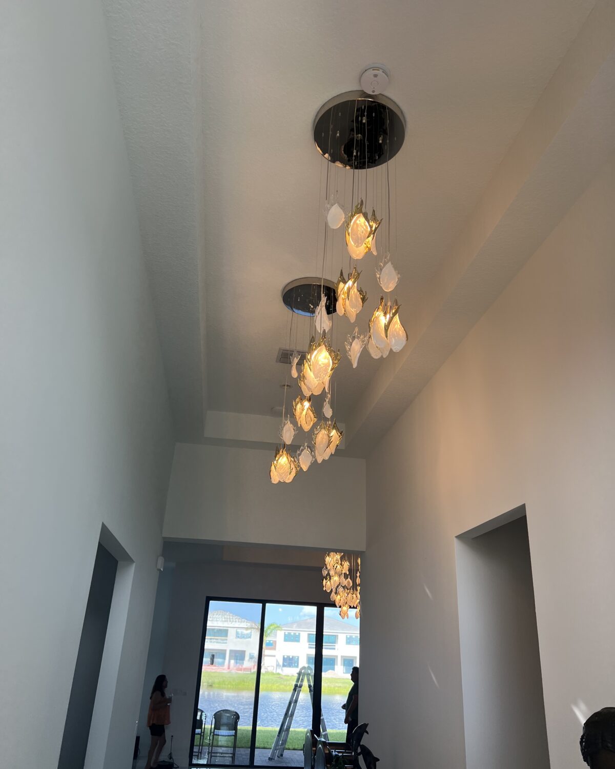 Hallway flame chandelier for the high ceiling 1